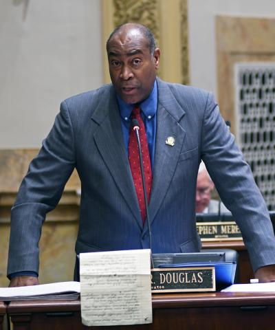 A photo from Thursday’s Senate session can be found here. It shows Sen. Donald Douglas, R-Nicholasville, testifying on Senate Joint Resolution 150, which would end the COVID-19 emergency declaration in Kentucky.