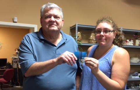 BCRTA president Fred Tate make donation to Morgantown Mission.
