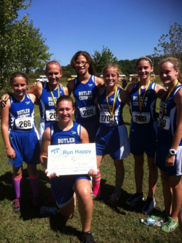 Varsity girls team with 2nd place troph at Gatorland Run  L to R Hannah Logan, Chanda Hampton, Amy Rogers, Dalys Bishop, Maranda Pierson, Hannah Perry, Olivia Neighbors 