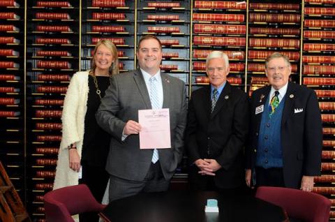  FRANKFORT  (January 25, 2018) – State Senator C.B. Embry (right) joined Marsy’s Law primary sponsor Senator Whitney Westerfield (second from left) and fellow bill cosponsors Senator Julie Raque Adams (left) and Senator Steve Meredith for the signing of the constitutional amendment in the Kentucky Secretary of State’s office. (Photo: LRC-PI)   