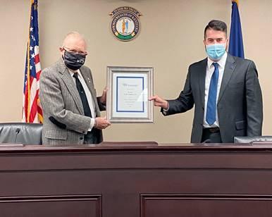 Pictured left to right: Senator C.B. Embry (R-Morgantown) and Todd Blevins, Kentucky State Director for the HSUS.