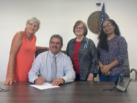 Lynda O'Driscoll, Butler County Judge Executive Tim Flener, Linda Deweese, and Abby Evans.