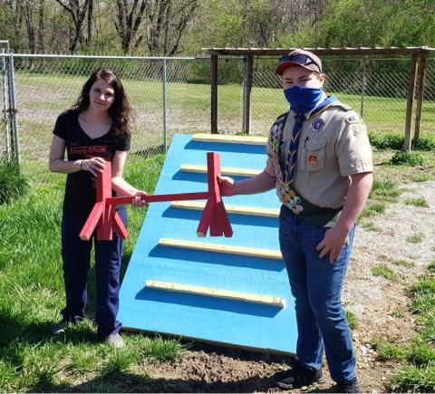 Ruby Fooks accepts the Dog Obstacle Course from Jared