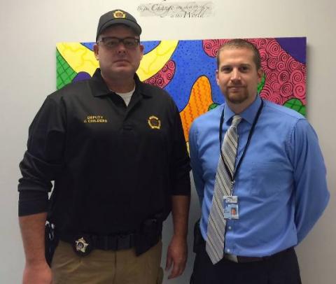 Deputy Jaman Childers and Josh Belcher, NBES Principal