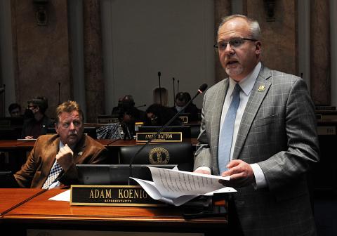 A photo from Monday’s proceedings in the Kentucky House of Representatives can be found here. It shows Rep. Adam Koenig, R-Erlanger, presenting House Bill 239 on the House floor. 