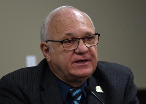 A photo from today’s Interim Joint Committee on Local Government meeting can be found here. It shows Sen. Michael J. Nemes, R-Shepherdsville, asking a question about the possibility of the state implementing an electric vehicle tax.