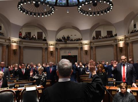 Lawmakers receiving the oath of office on the House floor during the first day of the 2023 Regular Session.   