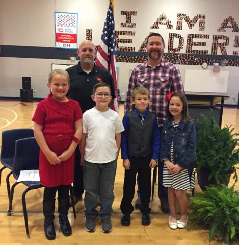 Leader in Me Student Program Directors Lydia Brown, Alex Bratcher, Case Hooten, and Evan Coley  led the school to honor veterans on this special day