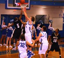 Trevor Jenkins rebounds.