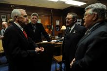 Rep. C.B. Embry, Jr. (second from right), R-Morgantown, joined by Rep. Ron Crimm (first from right), R-Louisville, talk with Kentucky Governor Steve Beshear shortly before the Governor delivered his budget address during the 2014 Regular Session.  Rep. Embry was one of a small group of House and Senate members selected to escort the Governor to House chambers for his address, which took place on Tuesday, January 21st. (Photo: LRC Public Information)