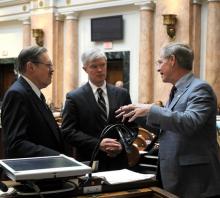 Rep. C.B. Embry, Jr., R-Morgantown (left); Rep. Dwight Butler, R-Harned (center); and Rep. Brad Montell, R-Shelbyville talks during a break in the Kentucky House of Representatives. (Photo: LRC Public Information)