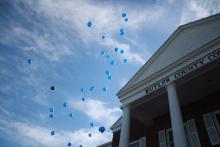 Blue balloons float into sky following Morgantown and Butler County's Autism Proclamation Ceremony Friday.
