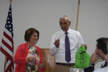 Morgantown Mayor Linda Keown assisted James Runion with the door prizes.