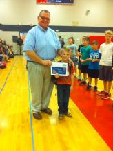 Morgantown Elementary Principal Chad Flener with Leader of the Week Bryson Britt. 
