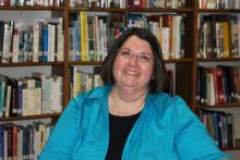 NBES Principal Elaine Daugherty prepares to retire.