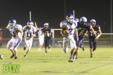 Havens takes the ball to the end zone.