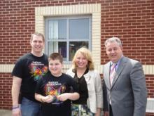BCMS Principal Robert Tuck, student Ethan Burden, Dr. Carrie Pritchard, and Butler County Superintendent Scott Howard. 