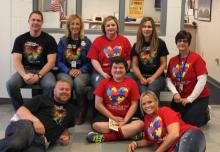 Ethan Burden with members of the BCMS staff and faculty.