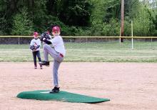 Brody Dockery of the Hood's Market Cardinals on the mound.