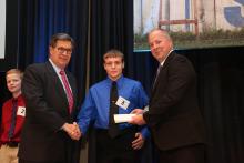  Jarrod Carathers of Butler County (center) is recognized for her performance at the 2017 KFB Variety Showcase in Louisville. Also pictured are David S. Beck, Kentucky Farm Bureau Executive Vice President (left) and Rob Payne, Kentucky Farm Bureau Insurance Company, Vice President of Claims (right).