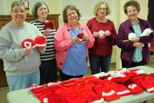 From left Linda Pendley, Sibyl Shelton, Christine Bratcher, Brenda Jenkins and Betty Phelps with the hats they made. Not pictured are Jonell Johnson, Kathy Vernon and Ann Bratcher
