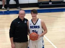 BCHS head basketball coach Calvin Dockery and Parker Rice.