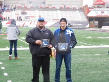 BCHS Head Coach Ryan Emmick and football standout Rex Henderson