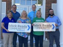 Judge Tim Flener, Supt. Robert Tuck, Dr. Amy Hood Waddle, Deborah Hammers, Amy Smith-Thomas, and Jacob McAndrews