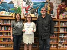 L-R Christy Havens, NBES spelling bee coordinator, Madison Jones, Darryl Dockery, BCRTA president.