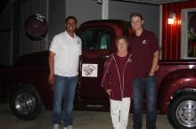 Coach Edwin Thompson, Mary Fleming, and Caleb Johnson