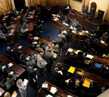 Legislators in the Kentucky House of Representatives line up to file bills on Monday, the last day to file new legislation in the House.