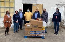 Photo Cutline: A group of realtors from Realtors® Hope for Hunger helped with food distribution in Butler County.