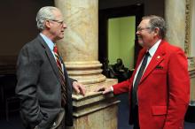State Sen. Ernie Harris, R-Prospect, (left) discusses legislation with state Sen. C.B. Embry Jr., R-Morgantown, during the 2016 General Assembly on Feb. 1 in Frankfort.   