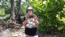 Bridges Hardin, 14, of Shelby County holds a chunky smallmouth bass caught last week from Elkhorn Creek in Franklin County. Stream fishing for smallmouth bass offers many things, in addition to catching fish, to keep a young angler’s attention. These experiences help hook young anglers into a lifetime of fishing.   