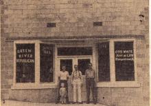 The building was built in 1948 by Judge Otis White and housed the Green River Republican and White's Attorney office.  Pictured is Onva White and son Hal, Judge Otis White and James D. Phelps.