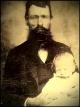 Robert Reason Dockery, the founding pastor of the church, and his granddaughter, Mable Pharris, who grew up to be a Sunday School teacher at the church.