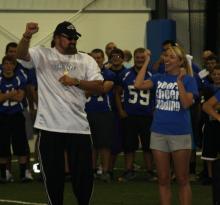 Hillbilly Jim cheering with Sierra Fields.