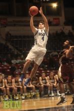 Zach Burden goes up for two of his 23 points in the game.