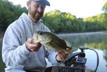 Geoff Roberts, conservation educator at Kentucky Fish and Wildlife’s Salato Wildlife Education Center, holds a largemouth bass caught early Monday morning from Barren River Lake. Barren River Lake State Resort Park, along with Lake Barkley State Resort Park, offer excellent accommodations for a weekend of largemouth bass fishing on two of the best lakes for the species in Kentucky.