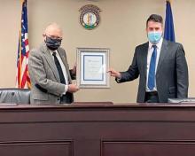 Pictured left to right: Senator C.B. Embry (R-Morgantown) and Todd Blevins, Kentucky State Director for the HSUS.