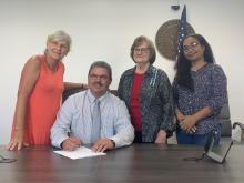 Lynda O'Driscoll, Butler County Judge Executive Tim Flener, Linda Deweese, and Abby Evans.
