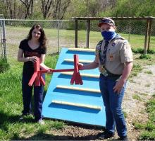 Ruby Fooks accepts the Dog Obstacle Course from Jared