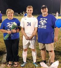 #34 Ernest Lee, son of Jeff and Lisa Lee.  He plans to attend the Naval Academy.