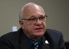 A photo from today’s Interim Joint Committee on Local Government meeting can be found here. It shows Sen. Michael J. Nemes, R-Shepherdsville, asking a question about the possibility of the state implementing an electric vehicle tax.
